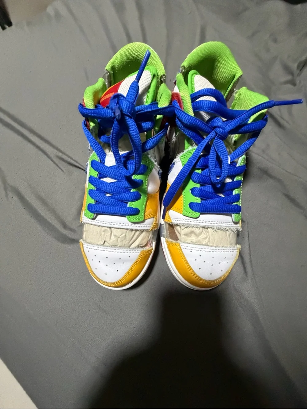 Nike Kids Multi-Panel Sneakers in Red, Yellow, Blue, Green, White authentic